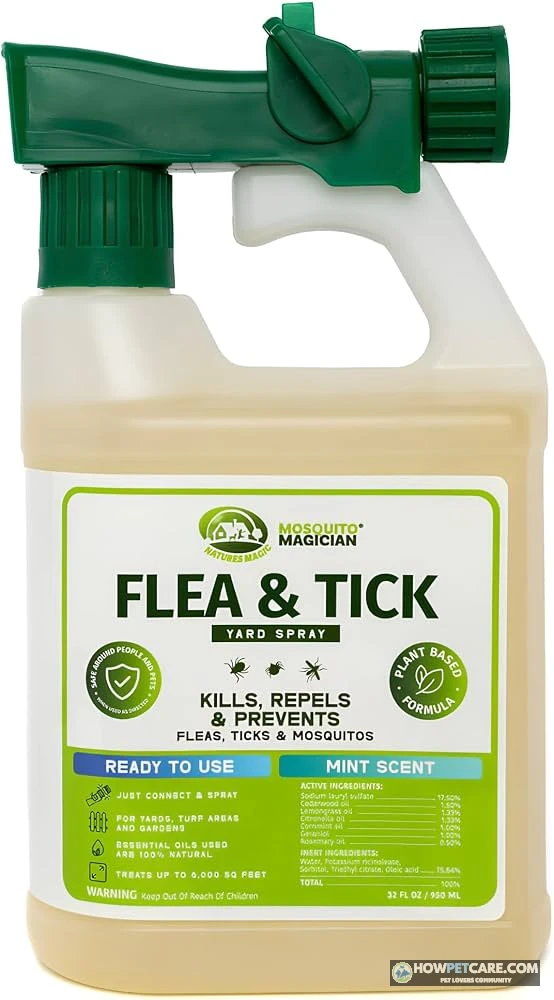 Lawn sprayer applying grass treatment for fleas on backyard turf